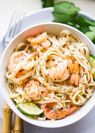 Coconut Lime Shrimp - Deliciously creamy shrimp cooked in an amazing coconut lime sauce and served over noodles or rice.
