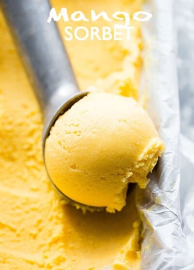 Mango Sorbet Recipe - Sweet, tart, rich, and SO delicious Mango Sorbet made with just 5 ingredients, and without an ice cream maker!