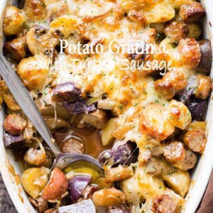 Cheesy Potato Gratin with Turkey Sausage and Mushrooms - An amazing side dish with potatoes, turkey sausage, and mushrooms baked to a delicious perfection. The cheese on top takes it OVER the top!