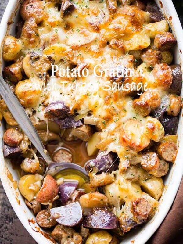 Cheesy Potato Gratin with Turkey Sausage and Mushrooms - An amazing side dish with potatoes, turkey sausage, and mushrooms baked to a delicious perfection. The cheese on top takes it OVER the top!