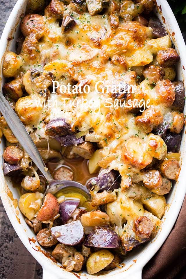 Cheesy Potato Gratin with Turkey Sausage and Mushrooms - An amazing side dish with potatoes, turkey sausage, and mushrooms baked to a delicious perfection. The cheese on top takes it OVER the top!