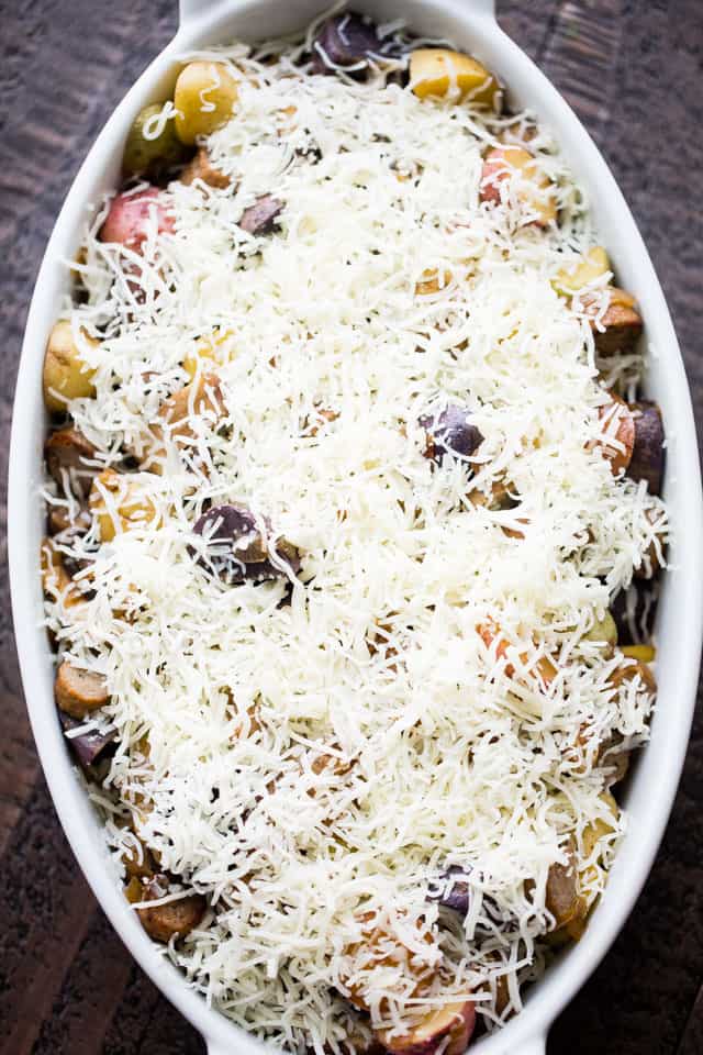 Cheesy Potato Gratin with Turkey Sausage and Mushrooms - An amazing side dish with potatoes, turkey sausage, and mushrooms baked to a delicious perfection. The cheese on top takes it OVER the top!