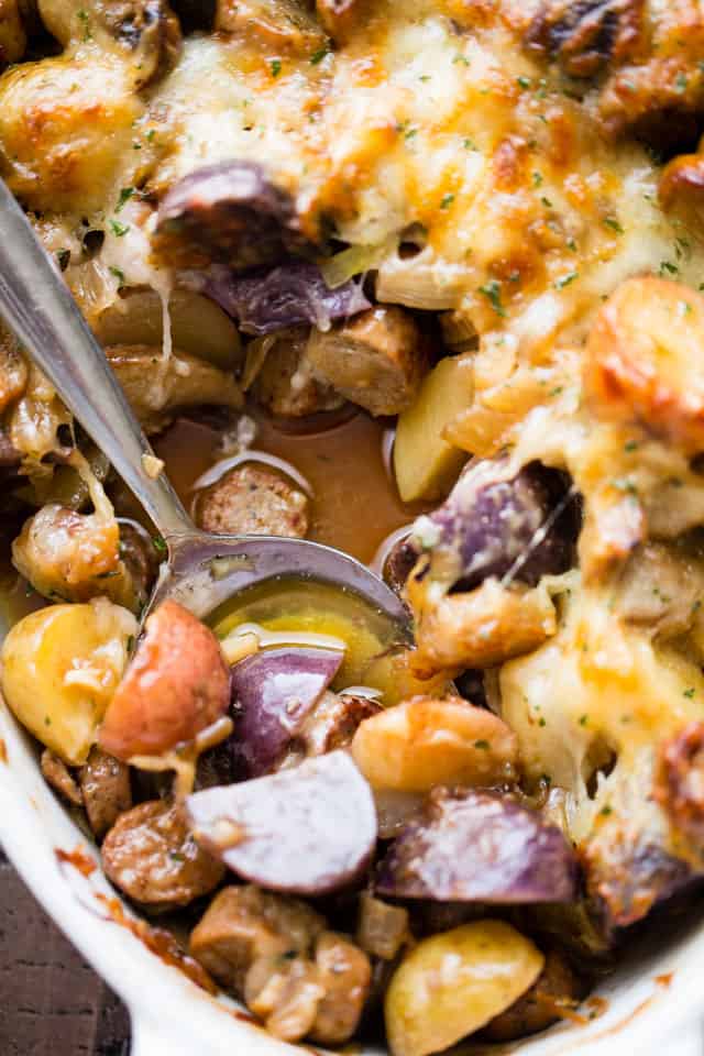Cheesy Potato Gratin with Turkey Sausage and Mushrooms - An amazing side dish with potatoes, turkey sausage, and mushrooms baked to a delicious perfection. The cheese on top takes it OVER the top!