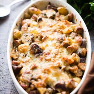 Cheesy Potato Gratin with Turkey Sausage and Mushrooms - An amazing side dish with potatoes, turkey sausage, and mushrooms baked to a delicious perfection. The cheese on top takes it OVER the top!