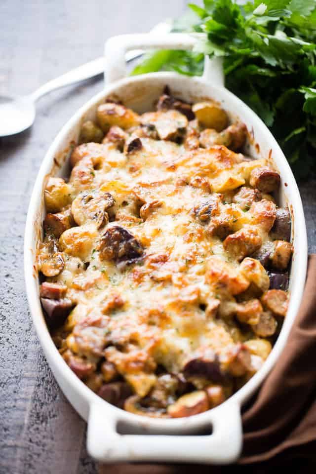 Cheesy Potato Gratin with Turkey Sausage and Mushrooms - An amazing side dish with potatoes, turkey sausage, and mushrooms baked to a delicious perfection. The cheese on top takes it OVER the top!