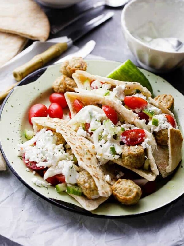 Turkey meatball pita pockets on a plate.