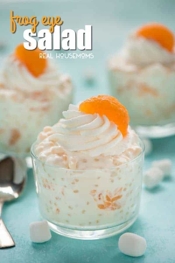 Frog eye salad in glass cups with whipped cream and mandarin oranges