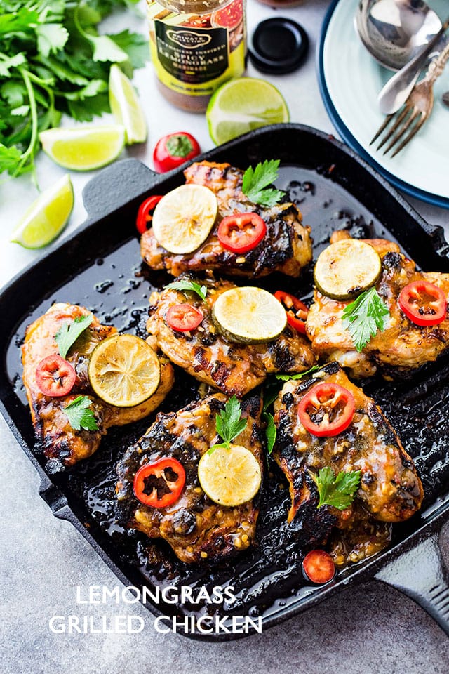 Six Lemongrass Grilled Chicken Thighs cooking on a black grill pan