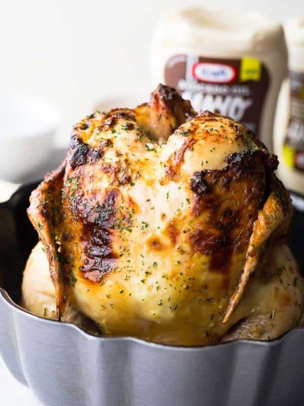 Bundt Pan Roasted Chicken - Super moist and incredibly flavorful bundt pan roasted chicken prepared with avocado-oil mayonnaise, herbs, and lemons!