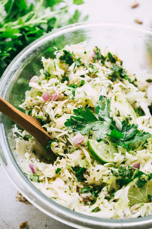 Cilantro Vinaigrette Coleslaw - Deliciously crunchy cabbage slaw tossed with an awesome cilantro vinaigrette!