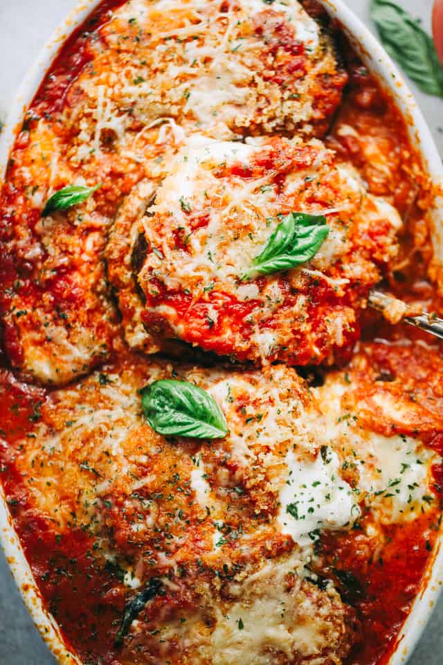 Up close shot of a baking dish with eggplant parmesan.