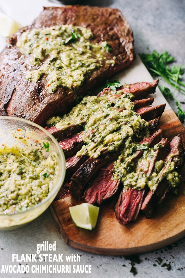 Grilled Flank Steak with Avocado Chimichurri Sauce - Deliciously juicy grilled flank steak served with an amazing blend of avocado and chimichurri sauce!