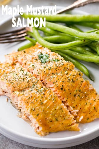 Maple Mustard Salmon in Foil - Delicious, sweet and tangy salmon coated with an amazing maple syrup and mustard sauce, and baked in tin foil to a flaky perfection!