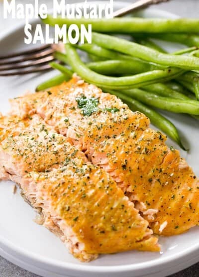 Maple Mustard Salmon in Foil - Delicious, sweet and tangy salmon coated with an amazing maple syrup and mustard sauce, and baked in tin foil to a flaky perfection!