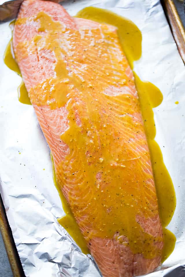 Maple Mustard Salmon in Foil - Delicious, sweet and tangy salmon coated with an amazing maple syrup and mustard sauce, and baked in tin foil to a flaky perfection!