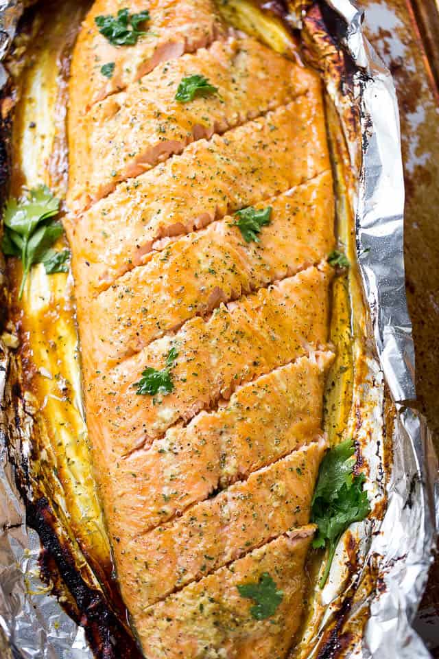 Maple Mustard Salmon in Foil - Delicious, sweet and tangy salmon coated with an amazing maple syrup and mustard sauce, and baked in tin foil to a flaky perfection!