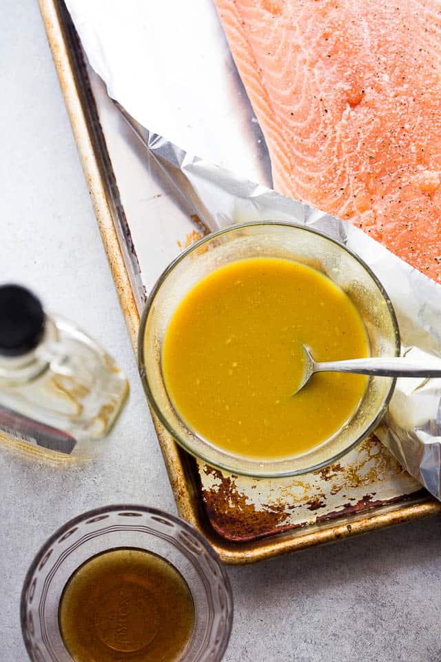 Maple Mustard Salmon in Foil - Delicious, sweet and tangy salmon coated with an amazing maple syrup and mustard sauce, and baked in tin foil to a flaky perfection!