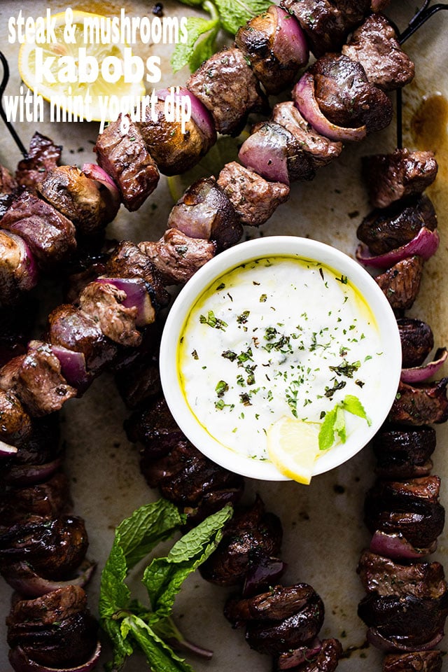 Steak and Mushroom Kabobs with Mint Yogurt Dip - Deliciously marinated steak kabobs with mushrooms and red onions grilled to a tender perfection and served with an amazing mint yogurt dip!