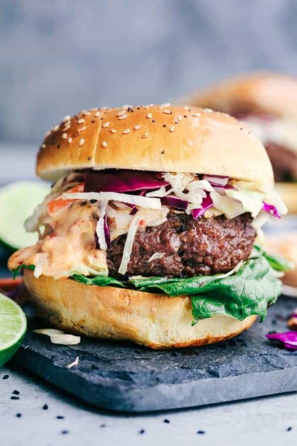 Asian Barbecue Burger with Lettuce, Slaw, and Sweet Chili Lime Mayo on a bun