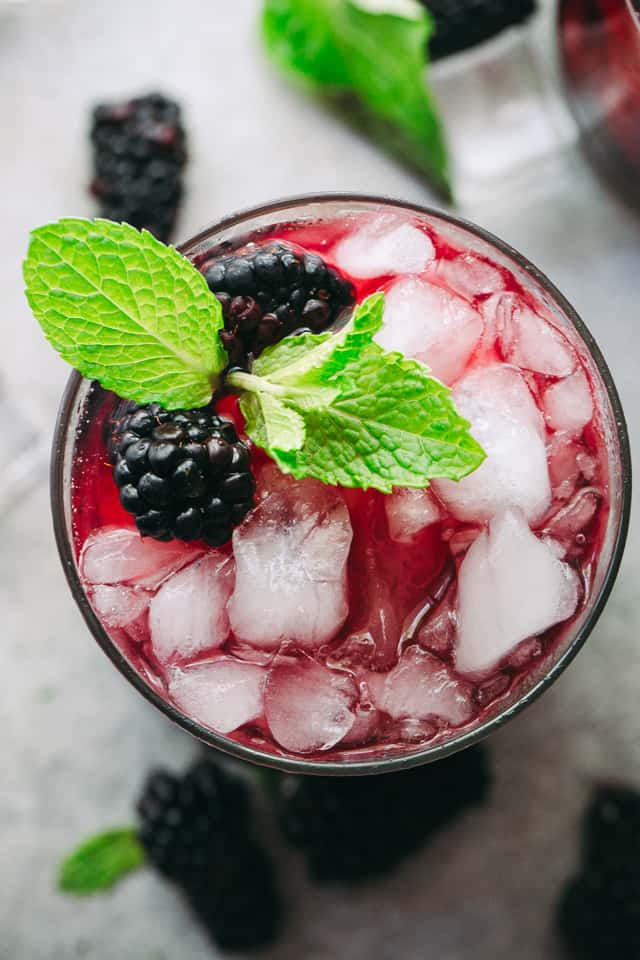 Blackberry Mint Julep - Sweet and fruity summer cocktail prepared with blackberries, mint, and bourbon. 