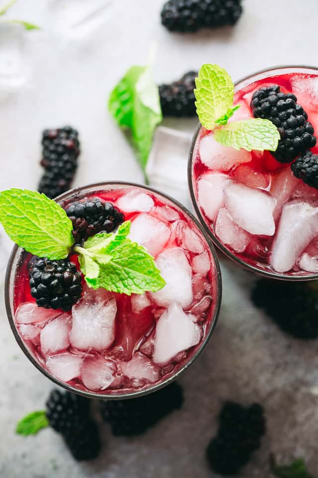 Blackberry Mint Julep - Sweet and fruity summer cocktail prepared with blackberries, mint, and bourbon. 