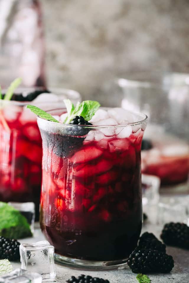 Blackberry Mint Julep - Sweet and fruity summer cocktail prepared with blackberries, mint, and bourbon. 