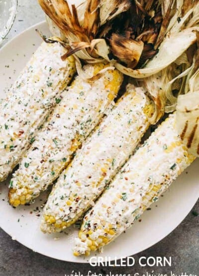 Grilled Corn with Feta Cheese and Chives Butter - Delicious and juicy grilled corn on the cob smothered with a creamy feta cheese compound butter!
