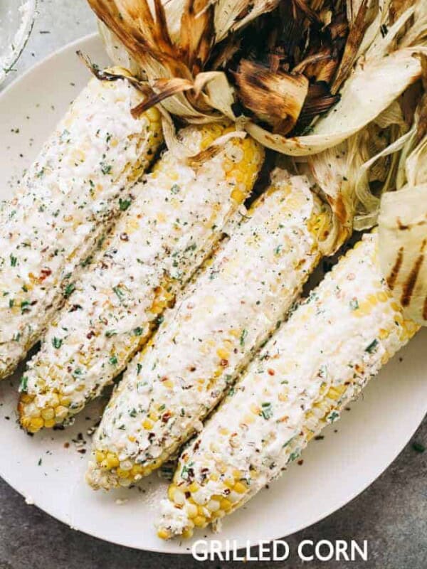 Grilled Corn with Feta Cheese and Chives Butter - Delicious and juicy grilled corn on the cob smothered with a creamy feta cheese compound butter!