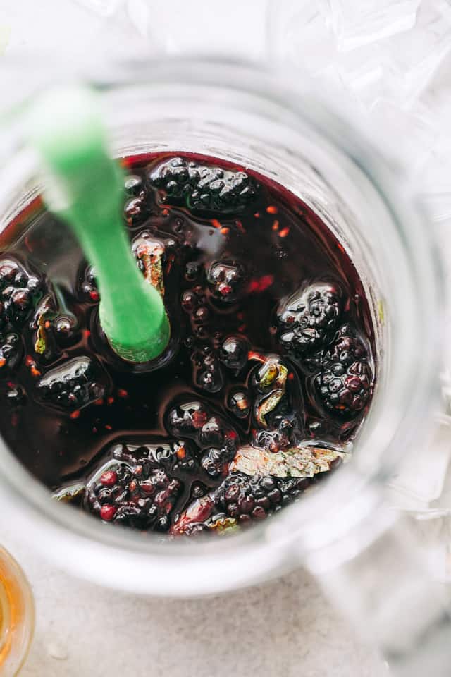 Blackberry Mint Julep - Sweet and fruity summer cocktail prepared with blackberries, mint, and bourbon. 