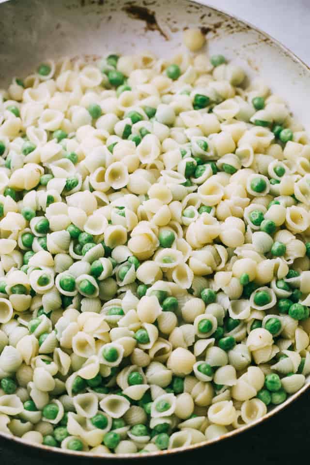 White Cheddar Shells and Peas in a bowl