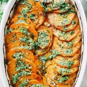Sweet Potato Roast with Parsley Pesto - Tender, extra-flavorful roasted sweet potatoes with olive oil, a touch of butter, fragrant berbere spice, and topped with the most delicious parsley pesto.