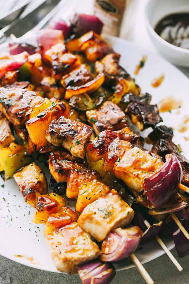 Pork, pineapple, and veggies threaded onto skewers.