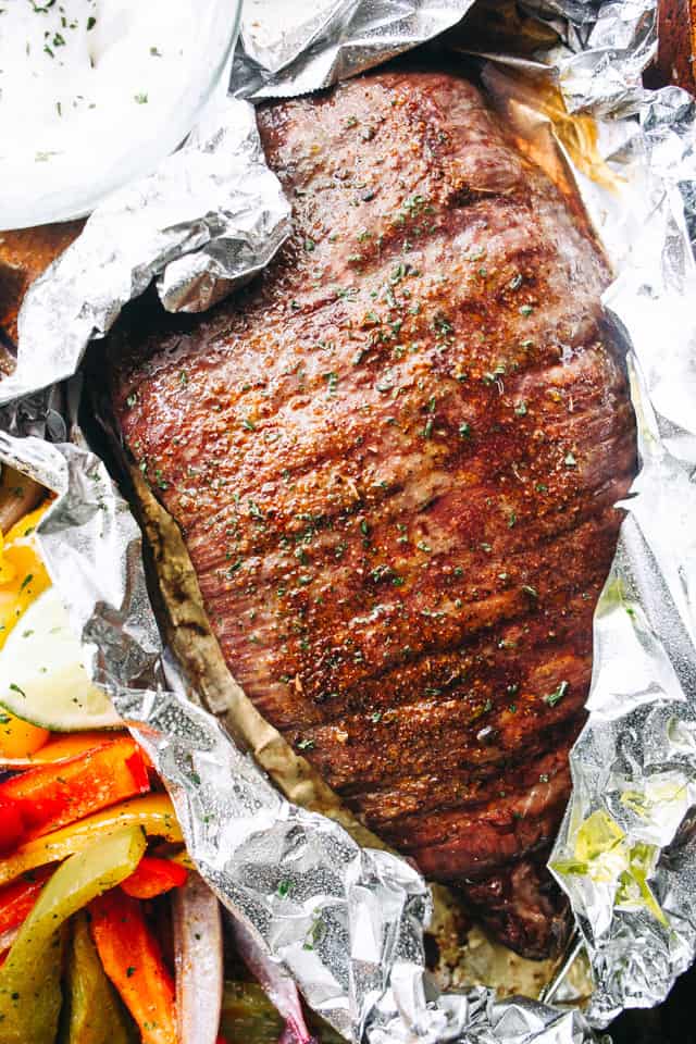 Slow Cooker Flank Steak and Peppers - Deliciously Seasoned