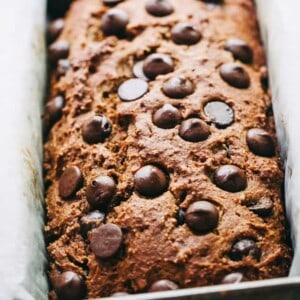 A freshly baked loaf of healthy pumpkin bread with chocolate chips