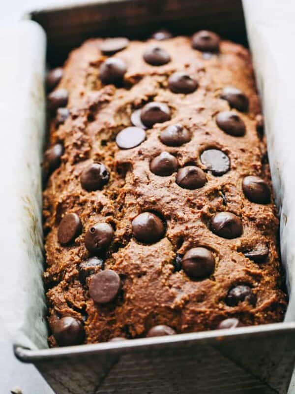 A freshly baked loaf of healthy pumpkin bread with chocolate chips