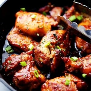 Spicy, Sweet and Sticky Chicken Thighs - An easy and quick one skillet meal including sticky, tender and delicious chicken thighs rubbed with a homemade spice rub and brushed with an amazingly sweet honey sauce.