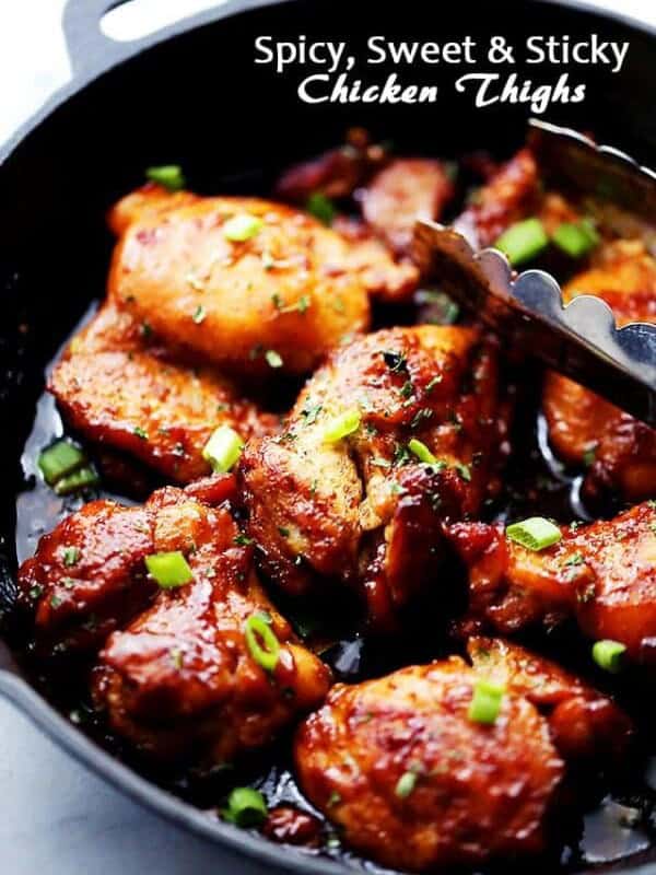 Spicy, Sweet and Sticky Chicken Thighs - An easy and quick one skillet meal including sticky, tender and delicious chicken thighs rubbed with a homemade spice rub and brushed with an amazingly sweet honey sauce.
