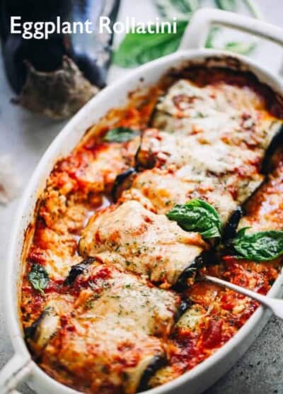 Eggplant Rollatini - Eggplant rollups stuffed with a cheesy ricotta blend, and baked in a delicious marinara sauce.
