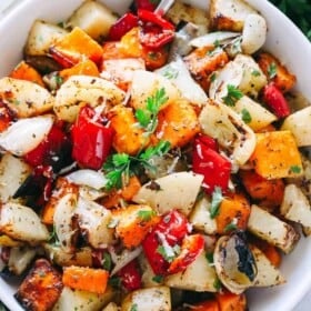 Garlic Parmesan Roasted Vegetables - Butternut squash, potatoes, peppers, and onions tossed in the best garlic parmesan dressing prepared with balsamic vinegar, herbs, seasonings, garlic, and olive oil.