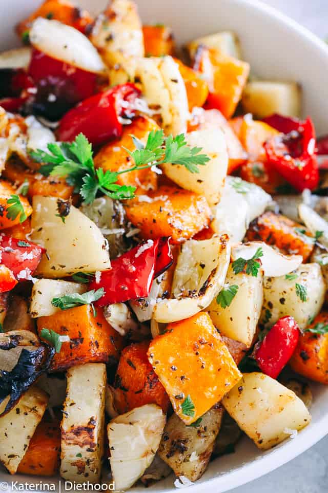Garlic Parmesan Roasted Vegetables - Butternut squash, potatoes, peppers, and onions tossed in the best garlic parmesan dressing prepared with balsamic vinegar, herbs, seasonings, garlic, and olive oil.