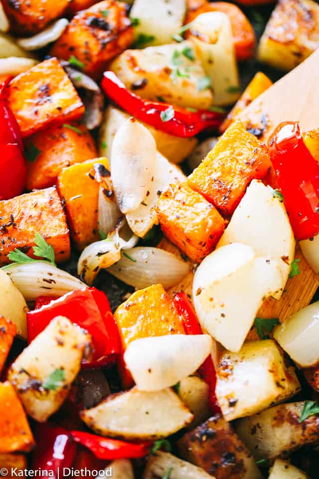 Stirring through Garlic Parmesan Roasted Vegetables.