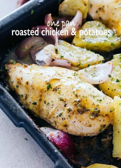One Pan Roasted Chicken and Potatoes - Quick and easy one pan dinner recipe with chicken coated in a sweet and savory honey mustard sauce and roasted alongside seasoned and incredibly flavorful potatoes and red onions. 