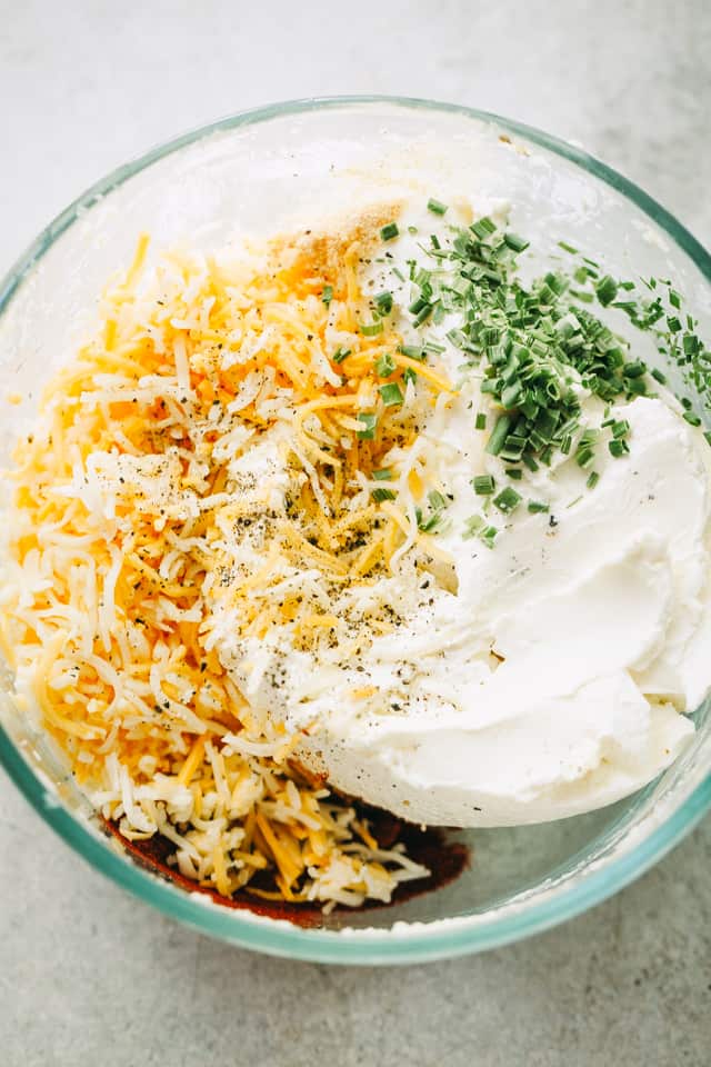 Adding the ingredients to a bowl. 