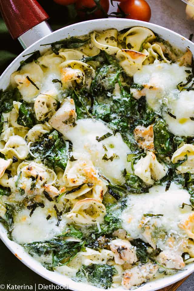 Easy Creamy Chicken Pesto Tortellini - Delicious, super easy dinner with creamy, cheesy tortellini, basil pesto, chicken and spinach.