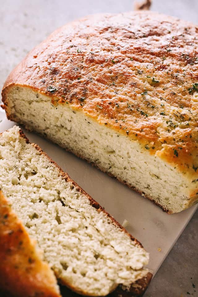 (No-Rise) Slow Cooker Basil Pesto Bread - This no-rise, no-fuss, SUPER DELICIOUS slow cooker bread is packed with basil pesto and it's probably one of the most flavorful bread recipes you will ever make! 