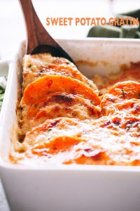 Sweet Potato Gratin - Lightened up, creamy, cheesy, seasoned sauce makes this sweet potato gratin simply irresistible! 