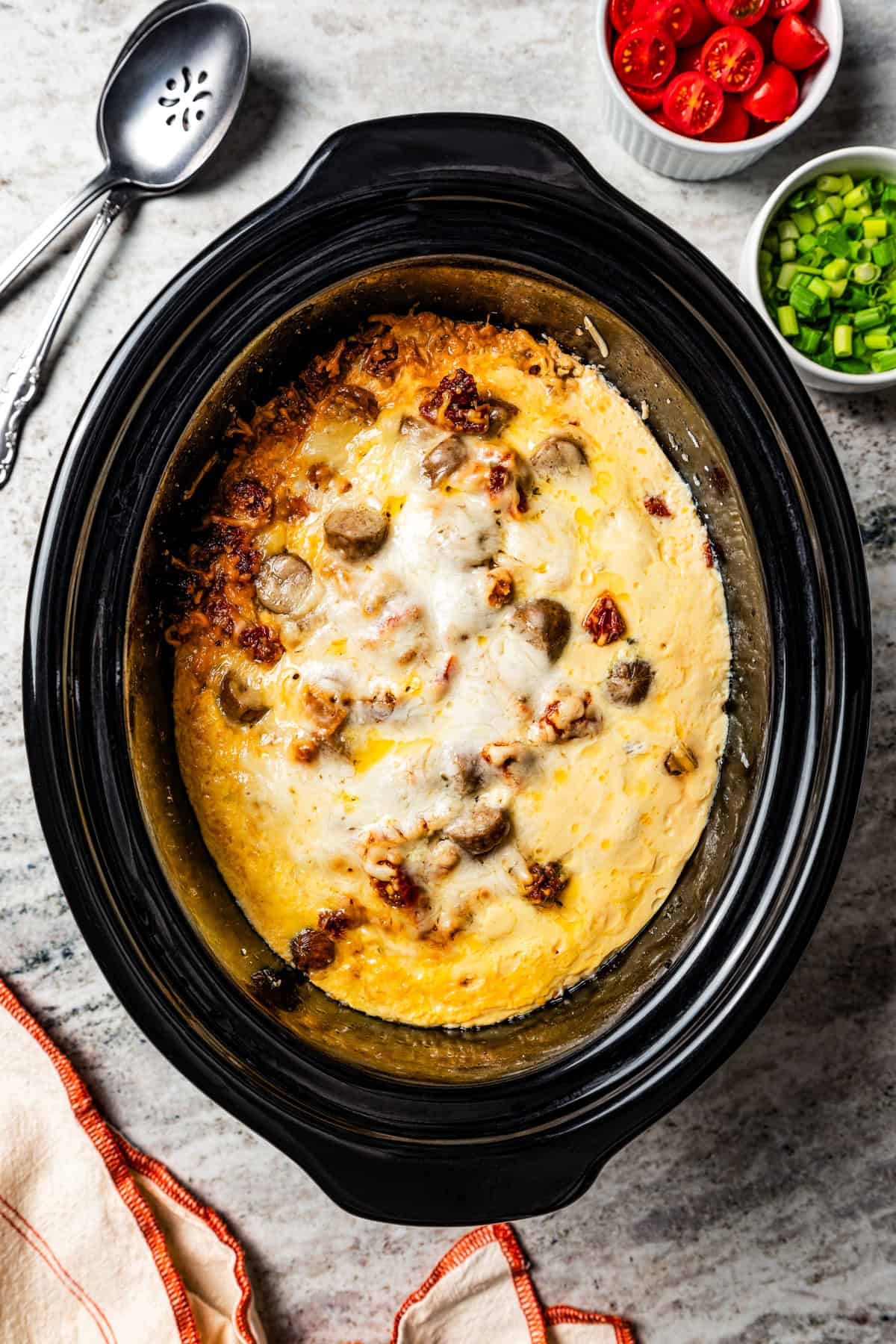 Overhead view of a finished crockpot breakfast casserole inside the slow cooker.