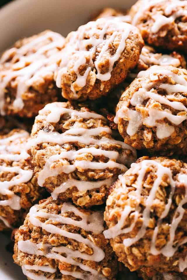 Apple Oatmeal Cookies - These perfectly soft and chewy oatmeal cookies are loaded with apples, oats, and cinnamon, and are topped with a simple sweet glaze.