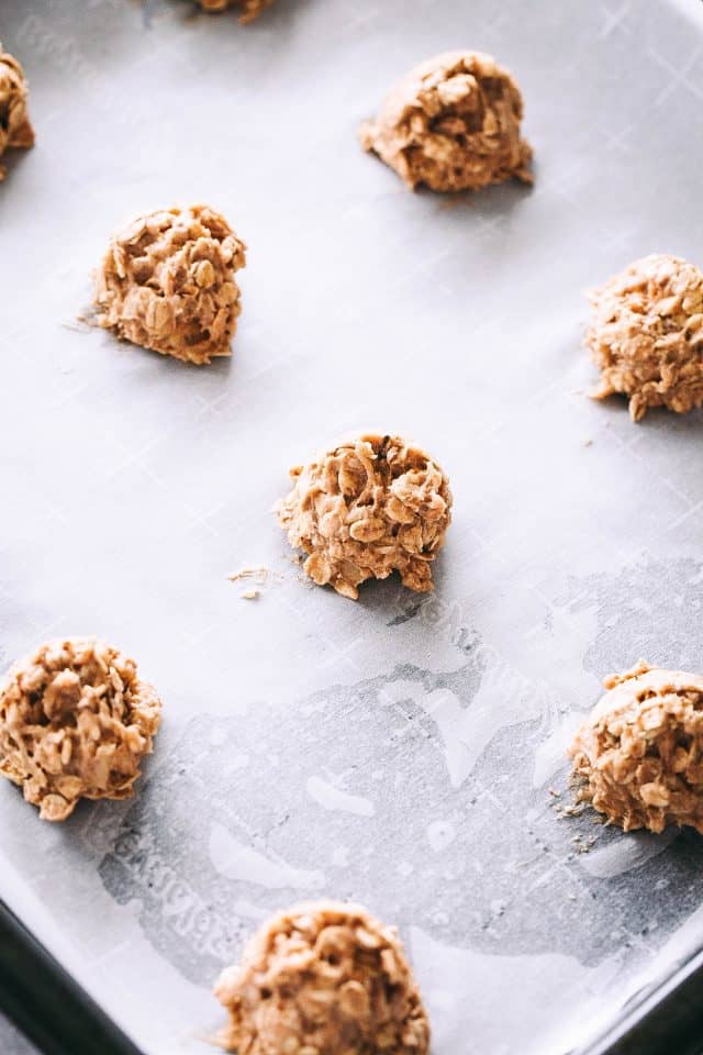 Apple Oatmeal Cookies - These perfectly soft and chewy oatmeal cookies are loaded with apples, oats, and cinnamon, and are topped with a simple sweet glaze.