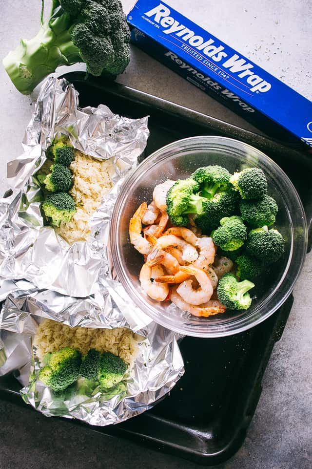 Shrimp Foil Packets with Broccoli and Rice - These foil packets are loaded with shrimp, broccoli and rice tossed in a delicious Asian inspired sauce, and they make for a quick, easy dinner packed with flavor!